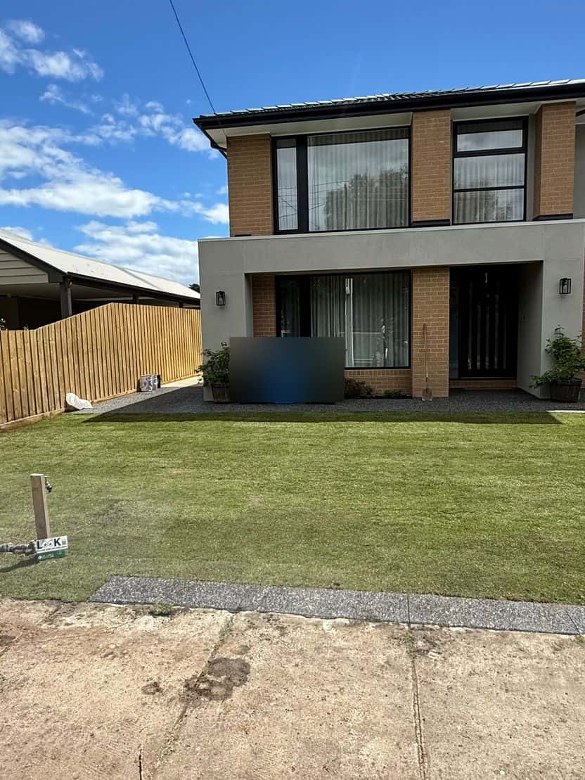 Finished Sir Walter buffalo front lawn behind a new timber fence in Cheltenham